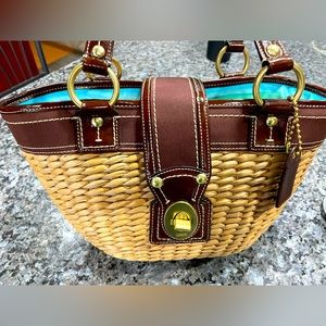 Coach straw purse with leather embellishments. Smoke free home.